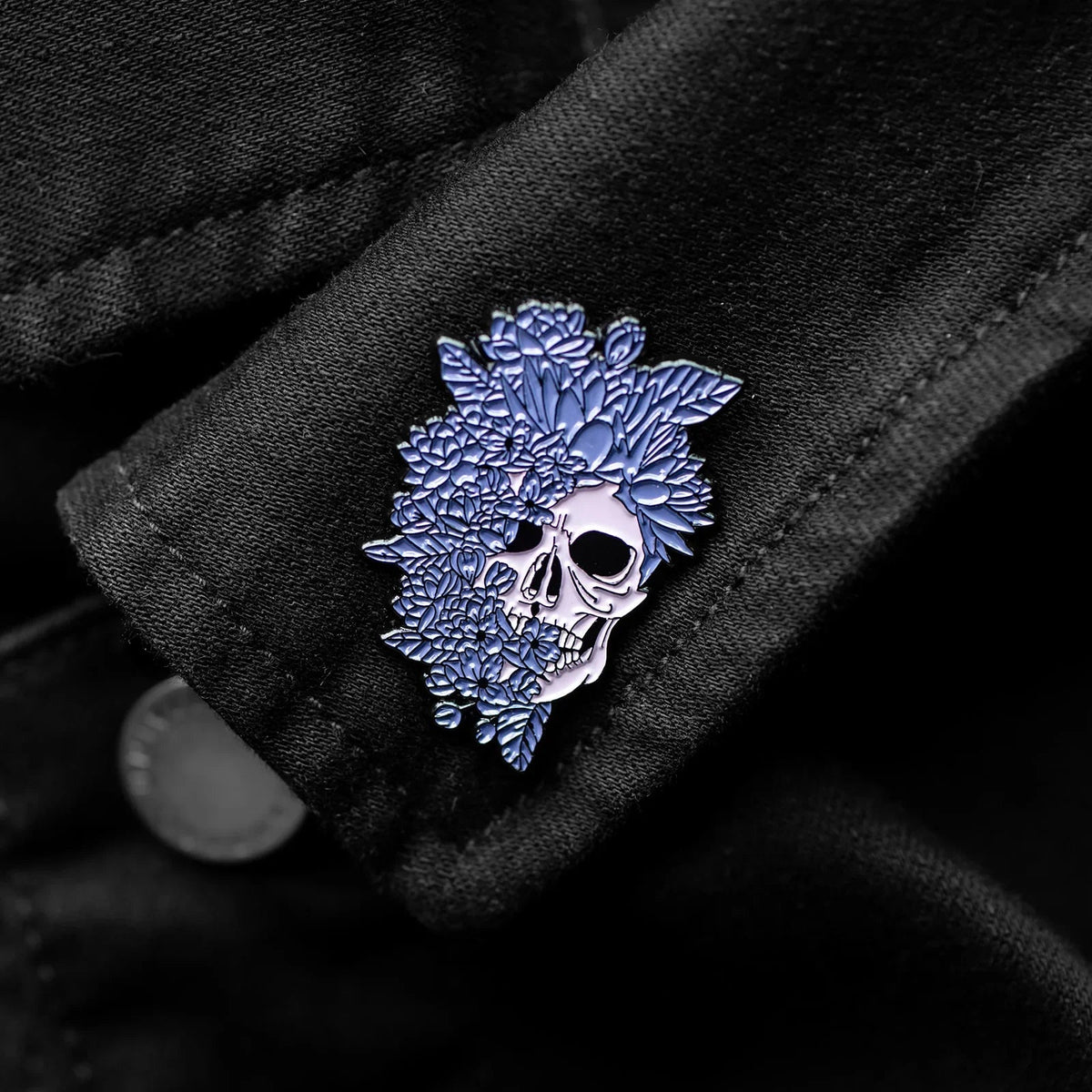 Sucreabeille How Luscious Is The Dark floral skull enamel pin on black denim.