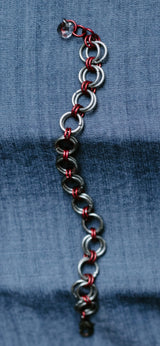 Japanese weave metal bracelet with clear Swarovski crystal from Armatora Catena